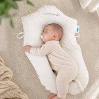 Justerbar babykudde | Vaggform